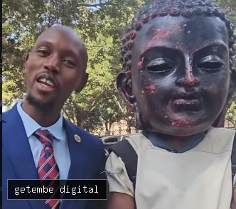 MOSIRIA PROMISES TO HELP MAN BEHIND GIANT BUDDHA COSTUME SECURE ADVERTISING GIGS